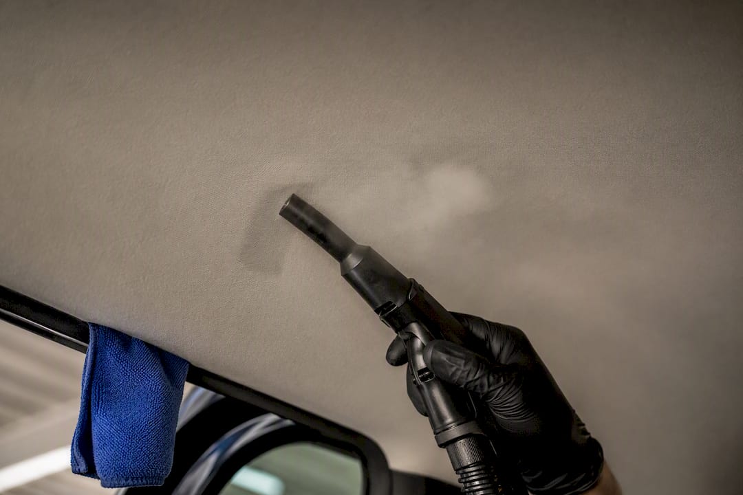 Low heat steam cleaning a car headliner